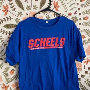 blue and red scheels shirt